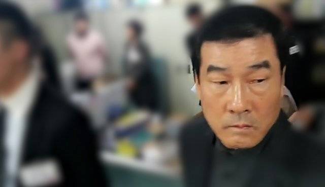 광주 학동 붕괴 참사와 관련해 금품수수 의혹을 받고 해외로 도피한 문흥식 전 5·18구속부상자회장. 사진 뉴시스