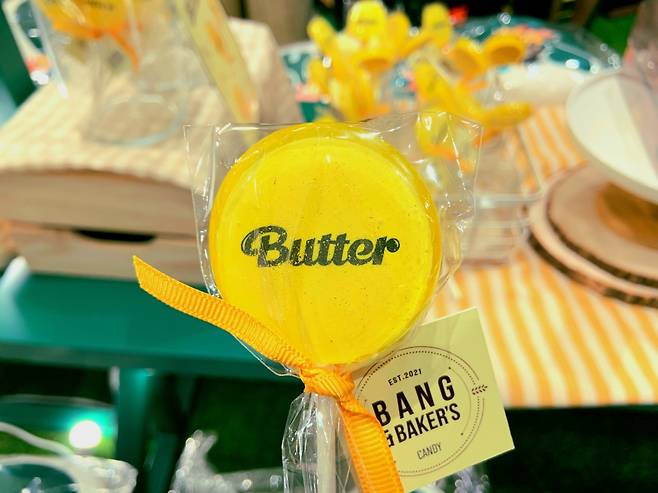 This file photo shows a BTS-themed lollipop named after the band’s megahit song “Butter.” (Park Jun-hee/The Korea Herald)