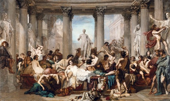 토마 쿠튀르(1815~1879)가 캔버스에 그린 ‘타락한 로마인들(1847)’. ‘빵과 서커스’의 포퓰리즘 정책으로 쇠락해 가는 로마를 화폭에 담았다. [사진 오르세미술관·위키피디아]