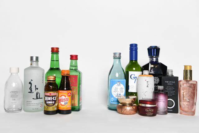 다양한 유리병 중 현재 국내에서 재활용되는 것은 왼쪽에 놓인 것들이다. 오른쪽의 와인병, 위스키병 등은 생산자가 직접 재사용하지 않는 이상 재활용이 안 돼 모두 버려질 처지다. 화려한 옷을 입은 화장품병 역시 재활용이 어렵다. 한지은 인턴기자