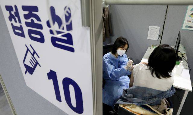 16∼17세 청소년(2004∼2005년생)과 임신부에 대한 코로나19 백신 접종이 시작된 지난 18일 오전 서울 동작구 사당종합체육관에 마련된 코로나19 예방접종센터에서 시민이 백신 주사를 맞고 있다. 뉴시스