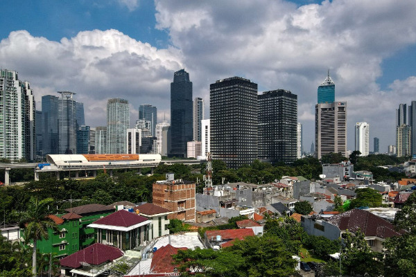 Blue sky is seen above the usually polluted Jakarta skyline on July 2, 2021, after several days of residents restricting themselves from leaving their homes for fear of contracting COVID-19.(AFP/BAY ISMOYO)