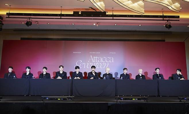 Boy band Seventeen poses during an online press conference Friday. (Pledis Entertainment)
