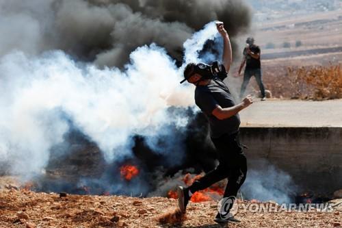 이스라엘의 정착촌 확장에 반대하는 팔레스타인 주민 시위. [로이터 연합뉴스 자료사진. 재판매 및 DB 금지]