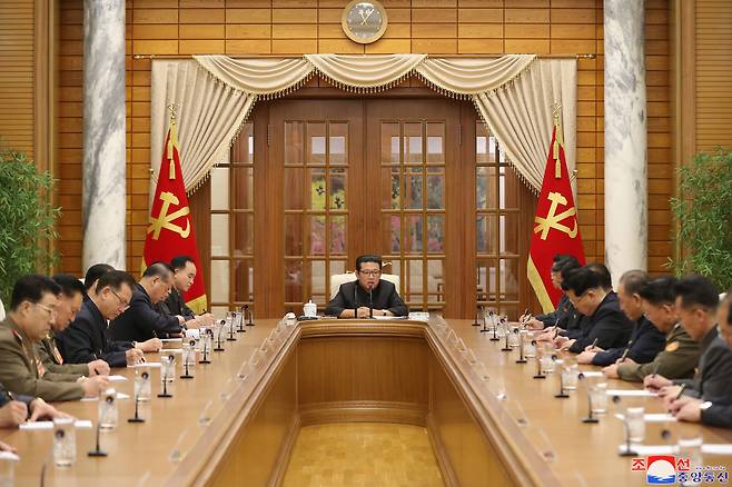 North Korean leader Kim Jong-un (center) convenes a politburo meeting of the country’s ruling Workers’ Party of Korea in Pyongyang on Wednesday, during which it decided to hold a plenary meeting later this month. (KCNA-Yonhap)
