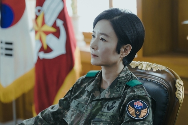 Actor Oh Yeon-soo will return to his main job in eight years.TVNs new drama, Military Prosecutor Doberman (playplayplay by Yoon Hyun-ho/director Jin Chang-gyu), is a military court act that depicts the story of Do Bae-man (played by Ahn Bo-hyun), who became a military prosecutor for money, and Cho Bo-ah, who became a military prosecutor for revenge, meeting to break down the black and rotten evil within Army and grow into a real military prosecutor.As Koreas first military court is covered with the subject matter, it will provide a sense of tension and immersion that is different from the previous courtroom, and the exhilarating catharsis delivered by exciting action.Here, we will announce the spectacular character play of Actors who boast perfect synchro rate with Character such as Ahn Hyun, Jo Bo-ah, Oh Yeon-soo, Kim Young-min and Kim Woo-suk, and stimulate the expectation of prospective viewers.Among them, expectations for Oh Yeon-soos performance, which has returned to his main business, Acting, are increasing day by day.For Oh Yeon-soo, this work Military Prosector Doberman is a return to the film for eight years after the 2014 starring Triangle except for Criminal Mind which appeared in 2017 special.Oh Yeon-soo, who has gathered hot topics just by casting news, is more interested than ever in what kind of appearance he will show in his return to Drama in eight years.Oh Yeon-soo plays the role of the first female division leader since the founding of the drama.Aging Young, who has a star on both shoulders without a single corruption, is a perfect person as a Soldiers.For someone, it is a place to be the ultimate goal, but it is only the beginning of the aging young with a huge ambition.Among them, the steel that is released is overwhelmed by the aura that Oh Yeon-soo emits.Not only does the sitting figure feel the dignity of the unbearable, but also the two star rank leaders clearly marked on the Military uniform show the presence of the character called the first female division commander.The eyes of Oh Yeon-soo fixed toward the other person are also intense because they feel a dark charisma that will freeze the other persons heart with their eyes silently.Here, Oh Yeon-soos expression, which maintains a poker face, shows a room of the aging young character in the drama that makes people obey, amplifying the expectation.The production team of Military Prosector Doberman said, I can not imagine aging young, not Oh Yeon-soo.It is safe to expect the most perfect character synchro rate that is not an exaggeration to say that it is completed with the aging young that only Oh Yeon-soo can express, so that the character is completely absorbed, he said.I would like to ask for your interest and expectation until the first broadcast. 