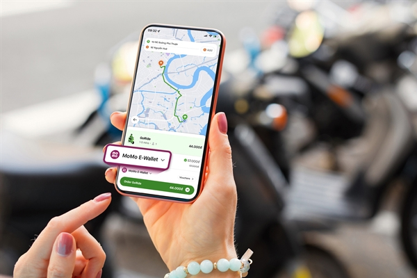 Gojek users in Việt Nam can now use the MoMo e-wallet to pay. — Photo courtesy of Gojek