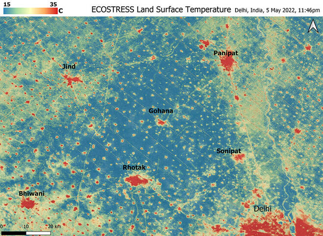 고도 400km 국제우주정거장의 관측장비로 찍은 5월5일 자정 무렵 인도 델리(오른쪽 아래)와 인근 지역의 열섬 분포도. 최대 온도차가 무려 20도에 이른다. 미국항공우주국 제공