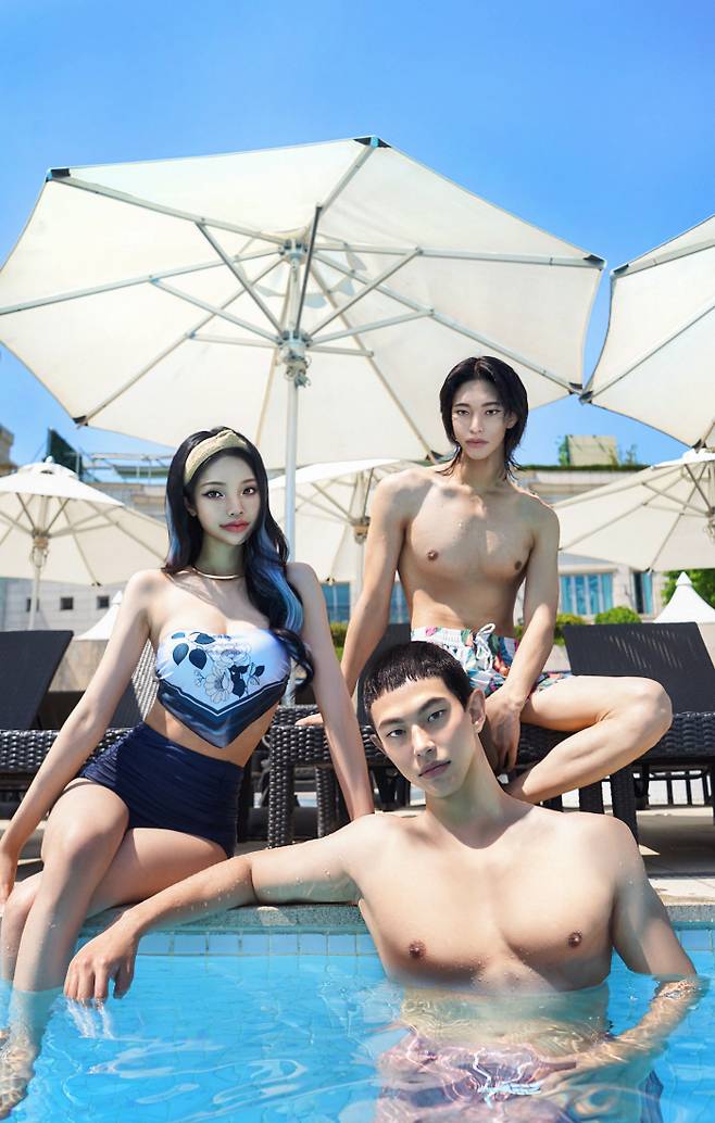 반얀트리 호텔 야외 수영장 오아시스에서 촬영을 하고 있는 호곤해일 가상 인플루언서 가족.