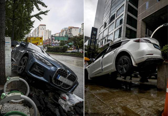 전날 내린 많은 비로 서울 강남 일대 도로 곳곳이 침수된 가운데 9일 오전 서울 서초구 서초대로에서 전날 물에 떠다니던 차량들이 물이 빠지자 인도에 올라와 있다. 뉴시스