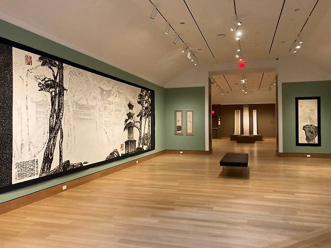 Park Dae-sung's works in the Hood Museum of Art at Dartmouth College, ahead of the opening of "Park Dae-sung: Ink Reimagined." "Bulguksa Temple in Winter" is seen on the left wall. (Gana Foundation for Arts and Culture)