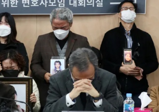 Buried Forever in Our Hearts: The families of the Itaewon Halloween crowd crush victims cry holding pictures of their loved ones at a press conference to announce their position at the Lawyers for a Democratic Society office in Seocho-gu, Seoul on November 22. Mun Jae-won
