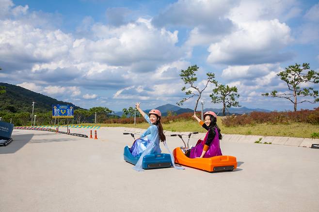 Visitors pose for photos at Ganghwa Luge. (Ganghwa Luge)