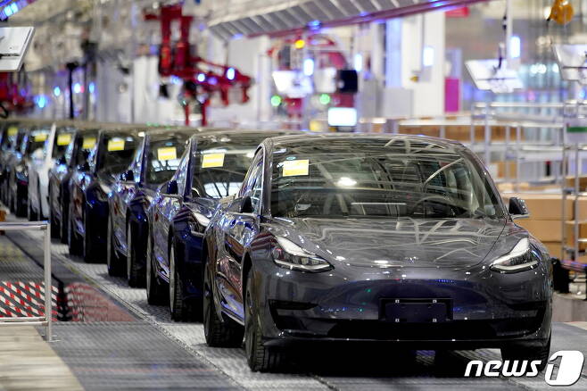 테슬라 모델3 차량이 중국 상하이 공장에서 출고를 앞두고 있다. ⓒ 로이터=뉴스1 ⓒ News1 김지현 기자