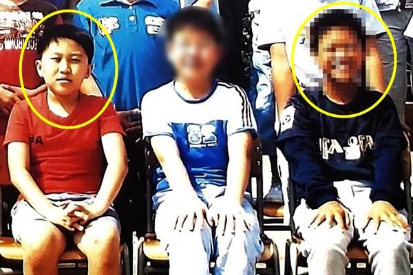 17년 전 학교 폭력 피해를 주장하고 있는 박한울씨가 자신의 페이스북에 올린 초등학교 재학시절 사진. 맨 왼쪽 빨간색 티셔츠를 입고 있는 아이가 피해를 주장하는 박한울씨. 오른쪽 검정색 상의를 입고 있는 아이가 가해자로 지목된 A선수. 페이스북 캡처