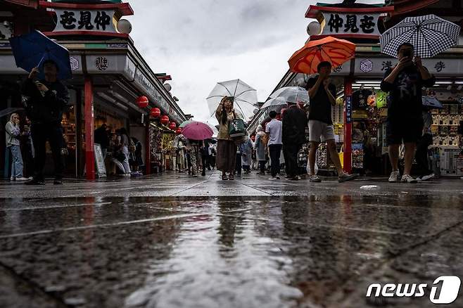 마와르 영향으로 많은 비가 내라고 있는 일본 ⓒ AFP=뉴스1