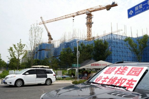 지난 10월 달러화 채권에 대해 디폴트(채무불이행)을 선언한 중국 부동산 개발업체 비구이위안이 베이징 외곽에서 진행 중인 공사 현장. ⓒ AFP/연합뉴스