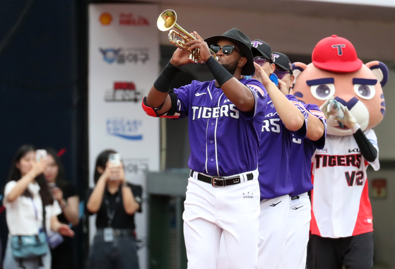 Kia Tigers' Socrates Brito enters the batter's box with a trumpet in the first inning during the 2023 Shinhan Bank SOL KBO League All-Star Game at Sajik Baseball Stadium in Busan in July 2023. [NEWS1]