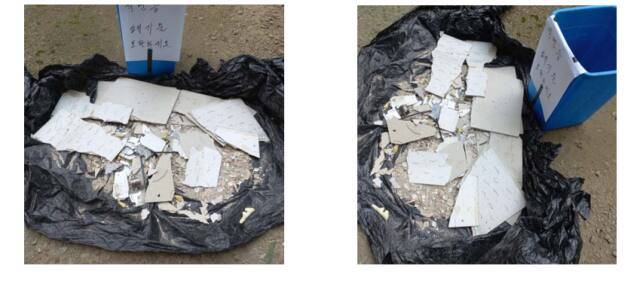 지난 5일 A청소업체가 파주교육지원청 학교지원센터에 청소 후 전달한 석면 추정 폐기물. 옆 쓰레기통에는 ‘석면 등 폐기물 보관하세요’라고 적혀 있다. 경기일보DB