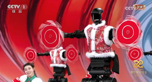 중국중앙TV(CCTV)가 지난달 29일 생방송한 연례 춘제(중국 설) 갈라쇼 ‘춘절연환만회(춘완)’ 에서 휴머노이드 로봇 16대가 등장해 인간 무용수와 함께 중국 북부지역 전통무용인 ‘뉴양거’를 선보이는 모습. CCTV 캡처·매경DB
