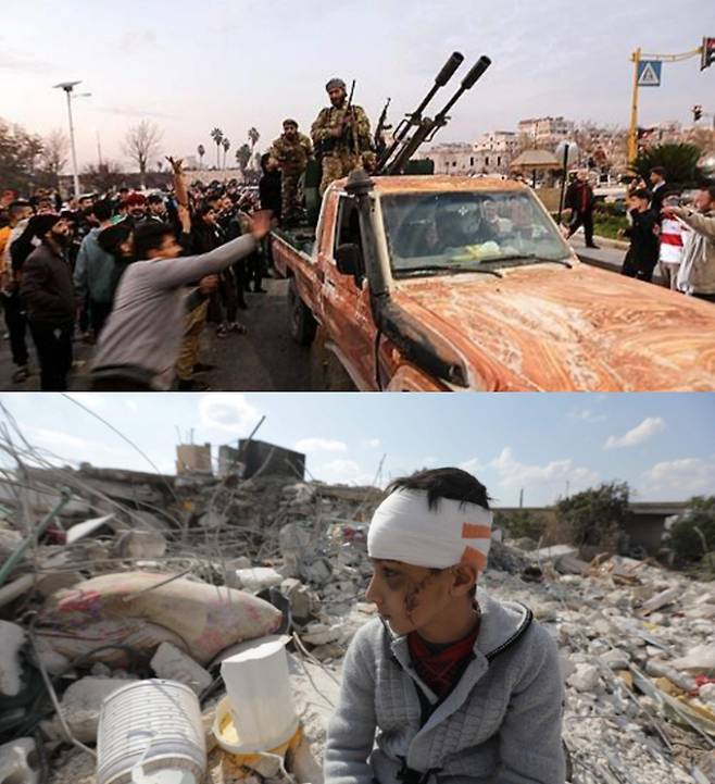 시리아 내전 무장병력 행렬과 폐허가 된 집터에 앉아 있는 부상당한 소년. 연합뉴스