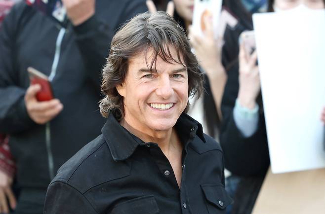 할리우드 배우 톰 크루즈가 서울김포비즈니스항공센터(SGBAC) 통해 내한해 미소를 짓고 있다. /뉴스1