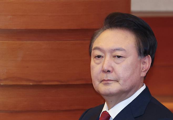 윤석열 전 대통령이 지난 1월 서울 종로구 헌법재판소에서 열린 탄핵심판 3차 변론에 출석하고 있다. 연합뉴스