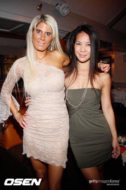 EAST HAMPTON, NY - AUGUST 22: (L-R) Sara Burack and Viet N'Guyen attend Hamptons Magazine's Celebration of an Evening Of Mixology With Tequila Avion on August 22, 2014 in East Hampton, New York. (Photo by Janette Pellegrini/Getty Images for Hamptons Magazine)