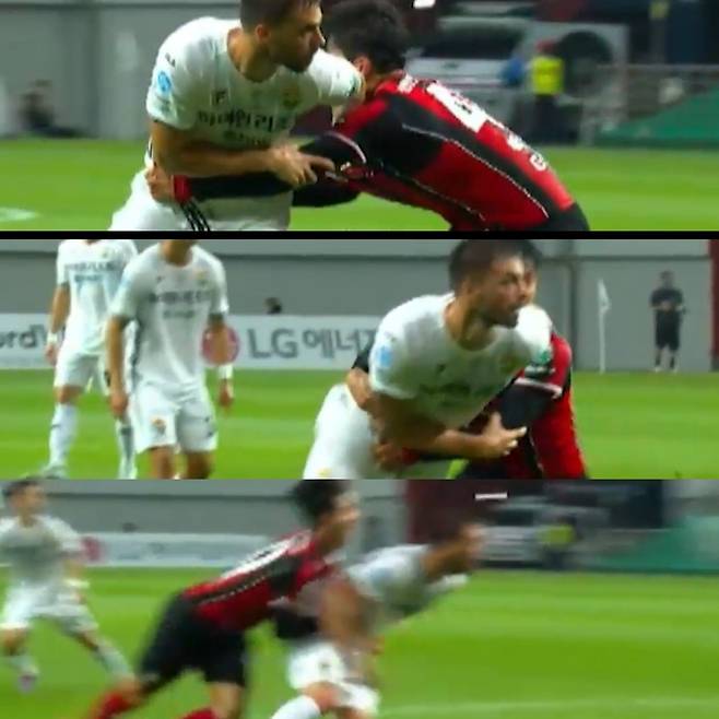 서울 박성훈이 강원 강투지의 허리를 팔로 감싸 넘어뜨리는 장면. 캡쳐 | 중계화면 리플레이