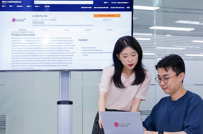 LG Uplus employees test ixi-Gen, a finance-specialized language model developed in-house, on a laptop. (LG Uplus)