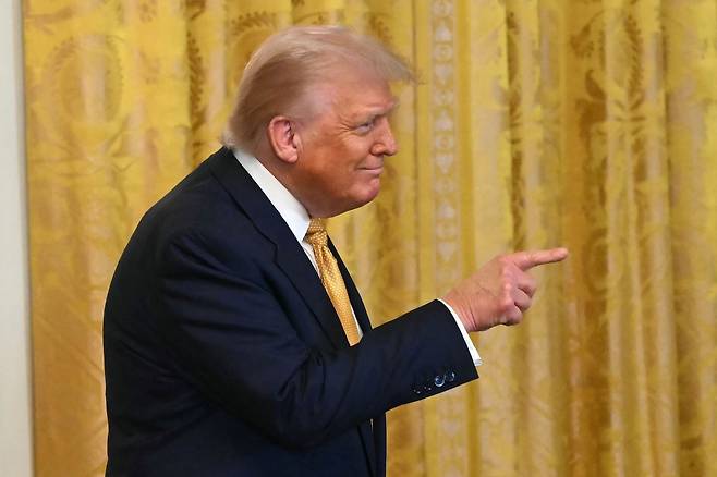 도널드 트럼프 미국 대통령이 22일(현지시간) 워싱턴DC 백악관에서 공화당 의원들과 만나 연설하고 있다. AFP연합뉴스