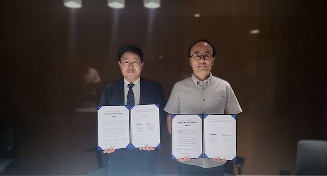 좌측부터 서상민 우리기술 시스템사업부문 부사장, 김성태 두산에너빌리티 원자력I&C사업부 상무. 우리기술 제공.