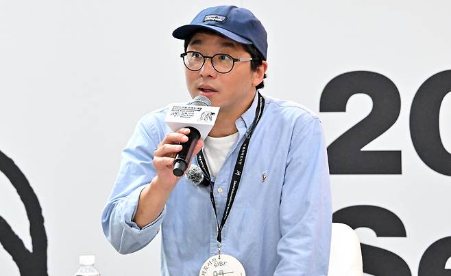Chef Choi Kang-rok speaks during a talk session for his debut essay collection "Cooking for Life" at the 2025 Seoul International Book Fair at Coex on Wednesday. (Im Se-jun/The Korea Herald)
