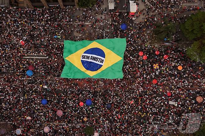 21일(현지시간) 브라질 상파울루에서 자이르 보우소나루 브라질 전 대통령에 대한 사면 법안 발의에 항의하는 대규모 시위가 벌어졌다. 2025. 09. 21. ⓒ 로이터=뉴스1 ⓒ News1 양은하 기자