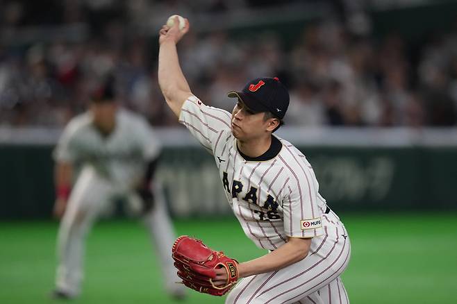 호주전 8회 등판한 다네이치. 삼자범퇴로 이닝을 끝냈다. 아웃카운트 3개 중 2개를 삼진으로 기록했다. AP 연합뉴스