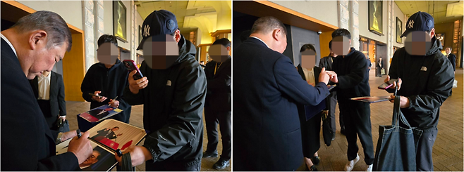 이시바 시게루 전 일본 총리가 한국의 청년이 가져온 사진첩에 사인을 하고 있다. /사진=X 캡처 @shigeruishiba