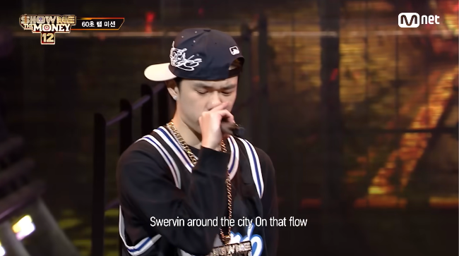 Raf Sandou performs "26" during the 60-second rap mission of "Show Me the Money 12." (YouTube @PlayMnet)