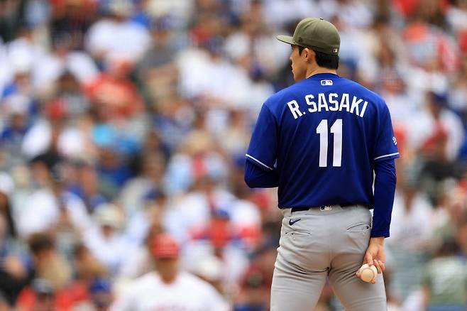 ANAHEIM, CALIFORNIA - MAY 17: Roki Sasaki #11 of the Los Angeles Dodgers pitches during the fourth inning of a game against the Los Angeles Angels at Angel Stadium of Anaheim on May 17, 2026 in Anaheim, California. Sean M. Haffey/Getty Images/AFP (Photo by Sean M. Haffey / GETTY IMAGES NORTH AMERICA / Getty Images via AFP)
<저작권자(c) 연합뉴스, 무단 전재-재배포, AI 학습 및 활용 금지>