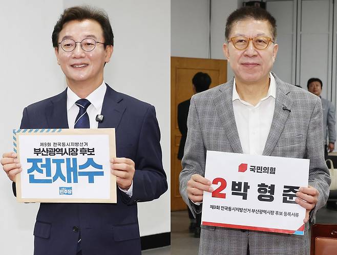 제9회 전국동시지방선거 후보 등록 첫날인 14일 부산 연제구 부산시선거관리위원회에서 전재수 더불어민주당, 박형준 국민의힘 후보(인쪽부터)가 후보등록을 하고 있다. 송봉근 객원기자
