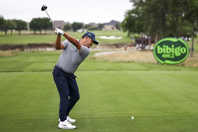 MCKINNEY, TEXAS - MAY 21: Si Woo Kim of South Korea hits a tee shot on the 13th hole during the first round of THE CJ CUP Byron Nelson 2026 at TPC Craig Ranch on May 21, 2026 in McKinney, Texas. (Photo by Mike Mulholland/Getty Images for The CJ Cup)