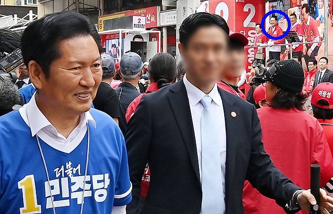 정청래 더불어민주당 총괄상임선거대책위원장과 장동혁 국민의힘 상임선거대책위원장(사진 위 파란 원)이 6.3지방선거 공식 선거운동 첫날인 21일 충남 공주시 산성시장을 찾아 유권자들에게 인사하며 지지를 호소하고 있다.김성태 객원기자