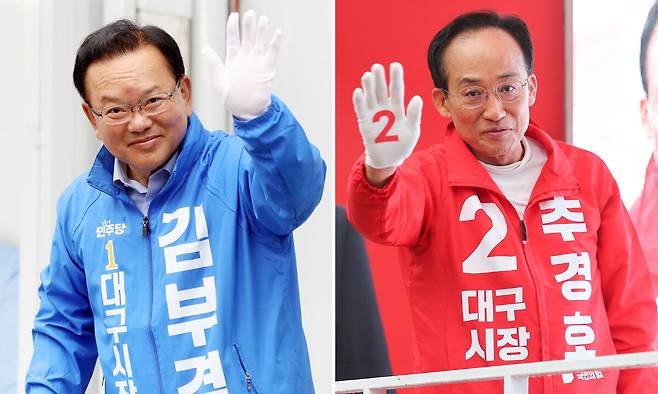 더불어민주당 김부겸 대구시장 후보(왼쪽)와 국민의힘 추경호 대구시장 후보가 최근 대구 범어네거리와 반월당사거리에서 출근길 인사를 하고 있다. 연합뉴스
