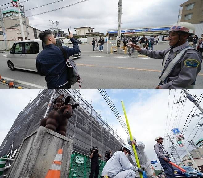 도쿄 가와구치코에 있는 편의점 로손은 이 건물 뒤로 후지산이 펼쳐지는 풍경이 아름다운 것으로 유명하다. 하지만 너무 많은 관광객이 몰려드는 ‘오버투어리즘’이 일어나면서 2024년 후지산이 보이지 않도록 상점 지붕 위로 높은 장막 설치 공사를 하고 있다. AP 연합뉴스