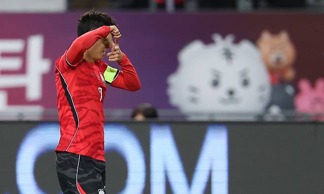Son Heung-min celebrates after becoming Korea's all-time leading goalscorer in a friendly against Uzbekistan in Gyeonggi on Oct. 6. YONHAP