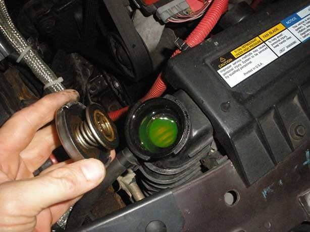 checking coolant level in car