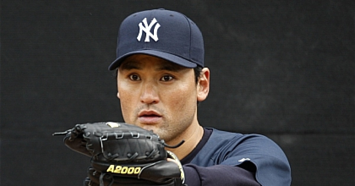 사인 주고받는 박찬호