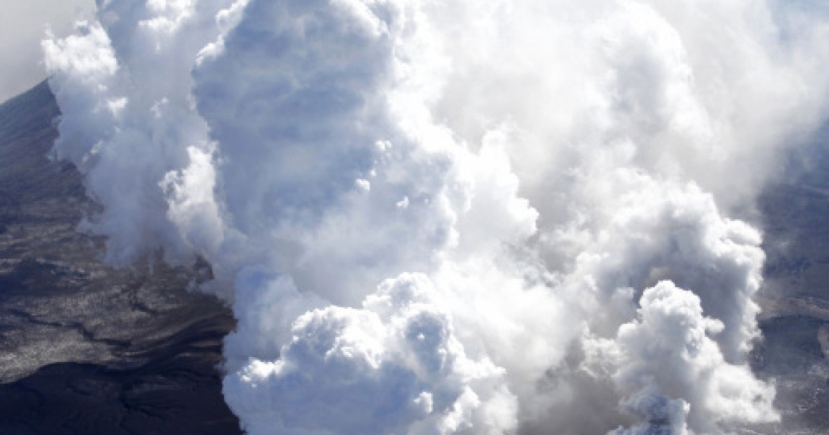 Japan volcano erupts with big blast of ash, rocks