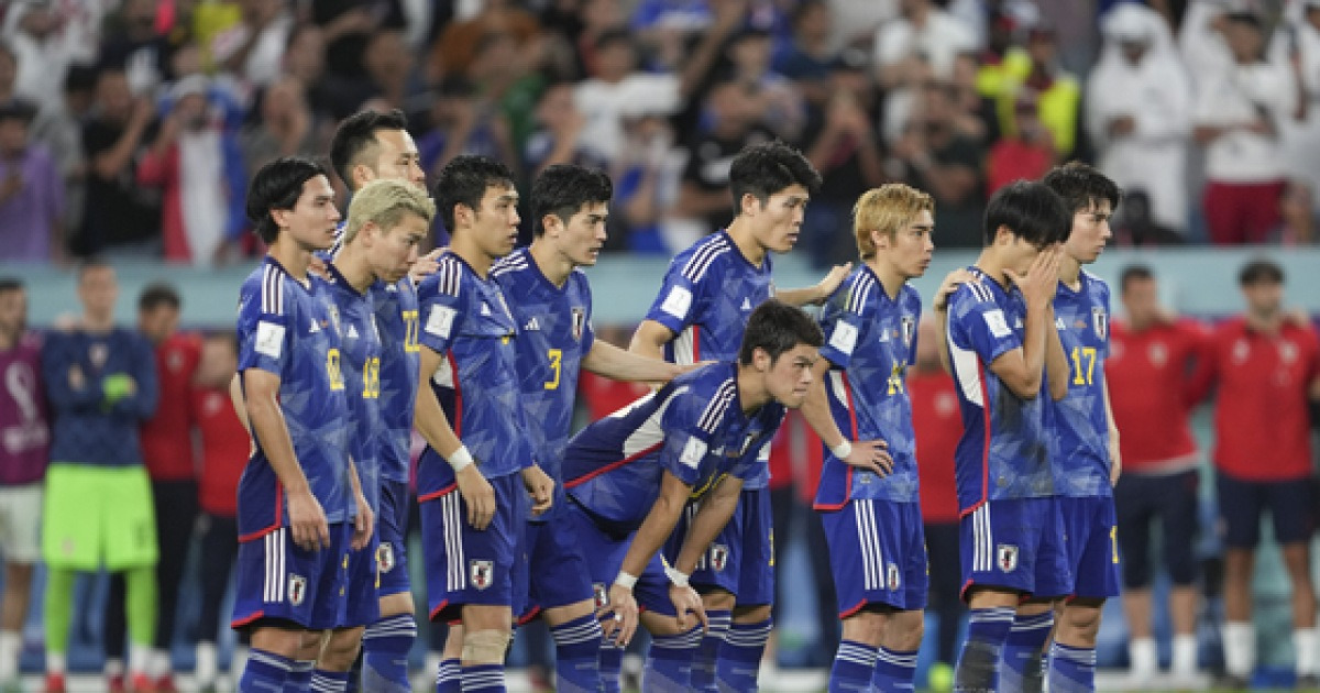 Japan exit world cup on penalties after grueling war of attrition with