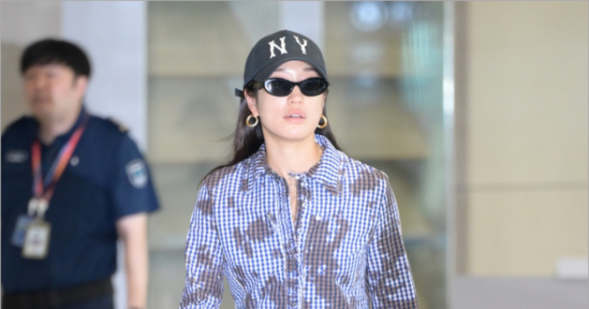 [MD포토] DJ 페기 구 '눈부신 입국'