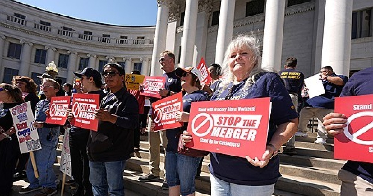 Grocery Stores Merger Protest